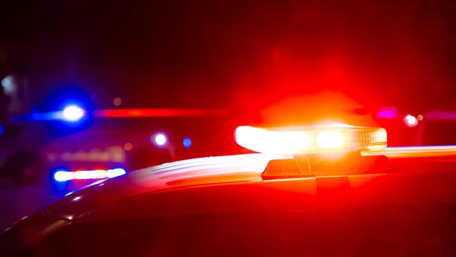 Police lights at a car crash emergency scene.