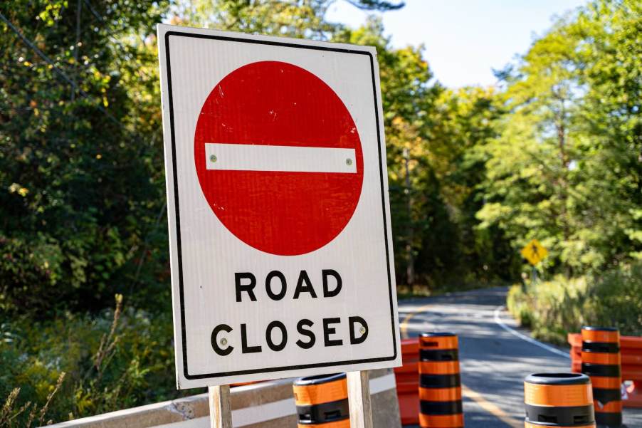 Road closed signs outside a bridge construction site in Detroit.