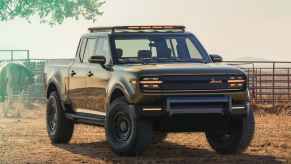 The Scout Terra EV near horses