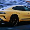 A bright yellow Xiaomi SU7 Ultra sports sedan that took EV records from the Porsche Taycan