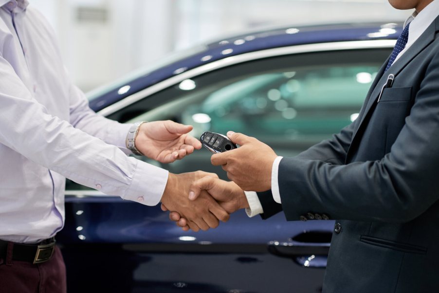 A depiction of a car trade-in at a dealership