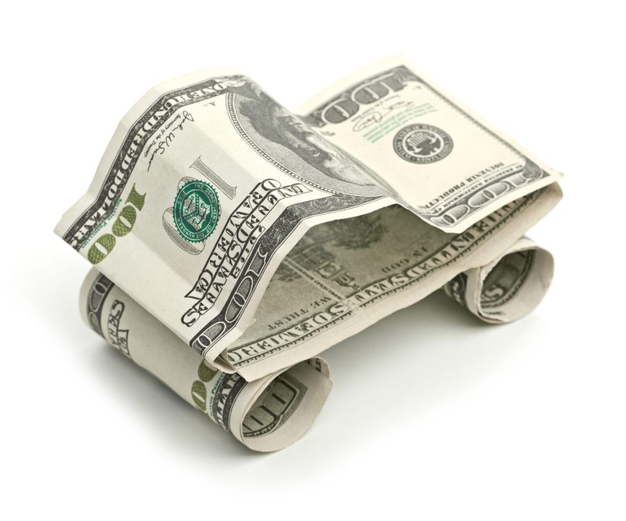 $100 bills shaped into a car form