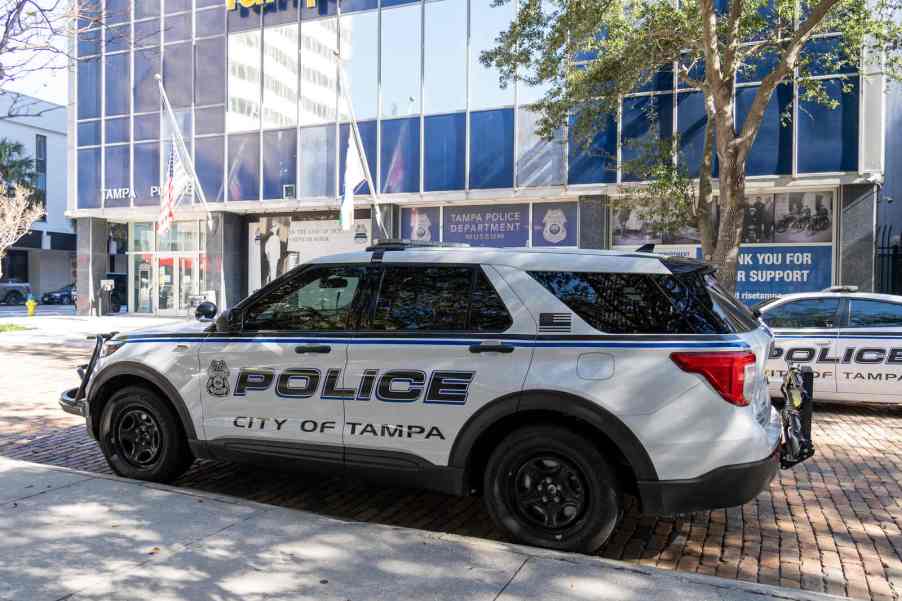 A Tampa Bay, Florida police cruiser SUV parked in left profile view