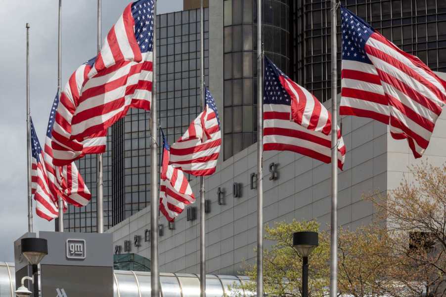American flags flying outside GM headquarters in Detroit, Michigan