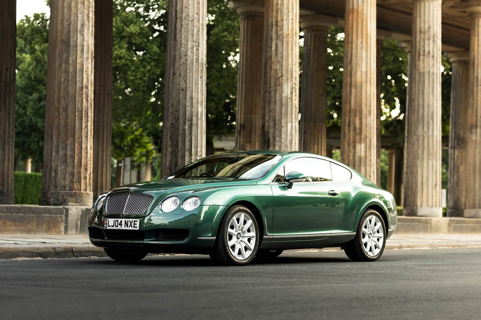 A green first-generation Bentley Continental GT.