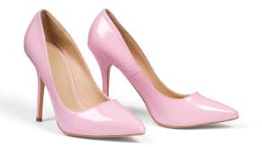 A Texas woman is facing manslaughter charges for slamming a speeding Porsche into two people and blaming it on a set of high heels.