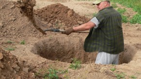 A man digging a hole