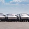 Rows of Tesla Cybertrucks parked in far front view
