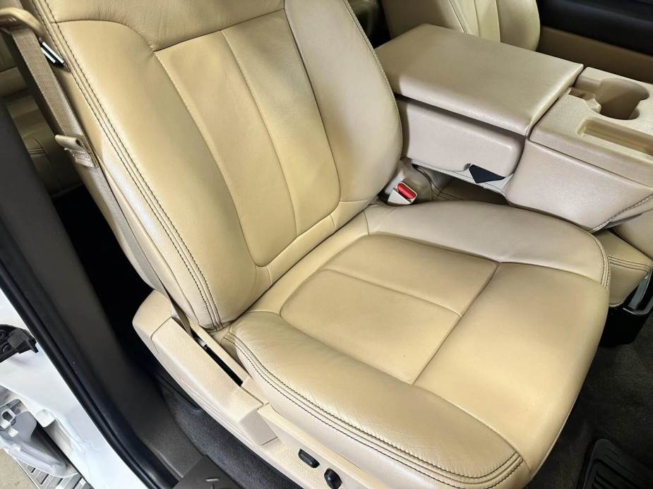 The tan leather right front seat in a 2017 Ford F-150 SuperCrew XLT