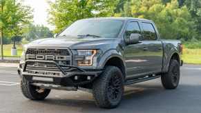 A grey 2018 Ford F-150 Raptor SuperCrew Hennessey VelociRaptor 600 parked in left front angle view