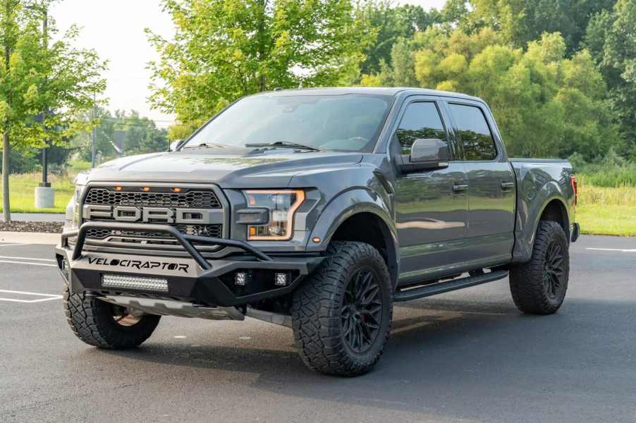 A grey 2018 Ford F-150 Raptor SuperCrew Hennessey VelociRaptor 600 parked in left front angle view