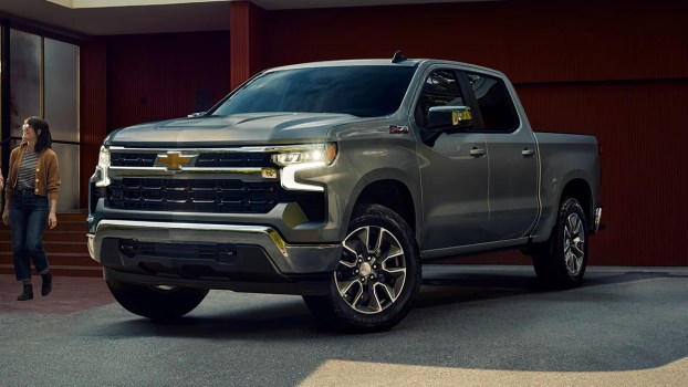 The 2025 Chevy Silverado near a home