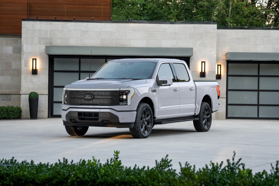 The 2025 Ford F-150 Lightning near a home