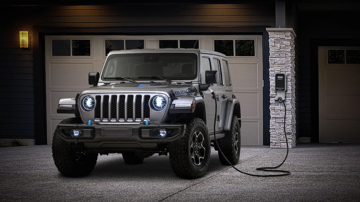 The 2025 Jeep Wrangler 4xe charging at a home