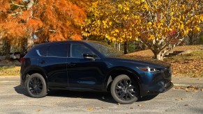 The 2025 Mazda CX-5 near foliage