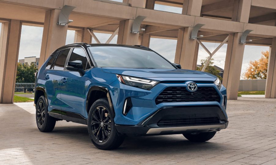 A blue 2025 Toyota RAV4 Hybrid parked in right front angle view