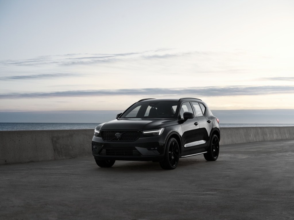 A black 2025 Volvo XC40 parked in right front angle view