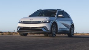 A white 2025 Hyundai Ioniq 5 EV parked in low left front angle view