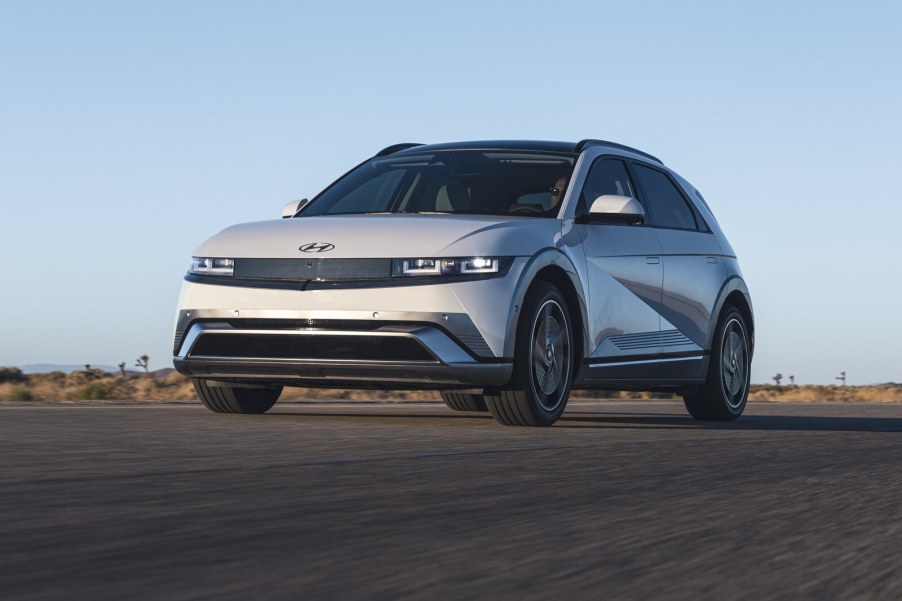 A white 2025 Hyundai Ioniq 5 EV parked in low left front angle view