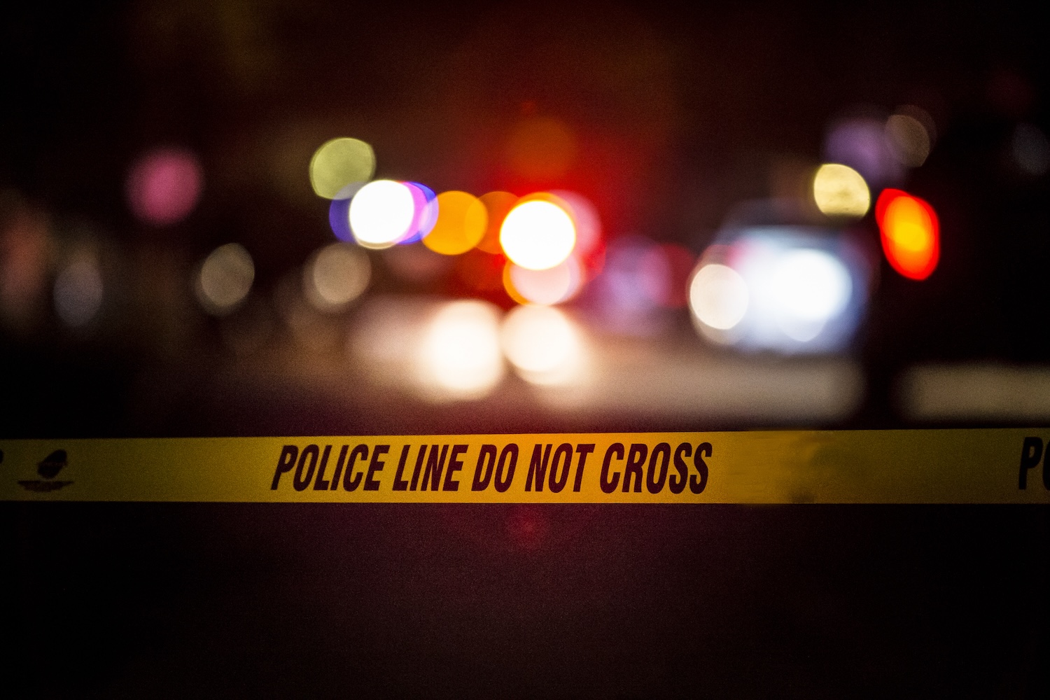 A crime scene with police car lights