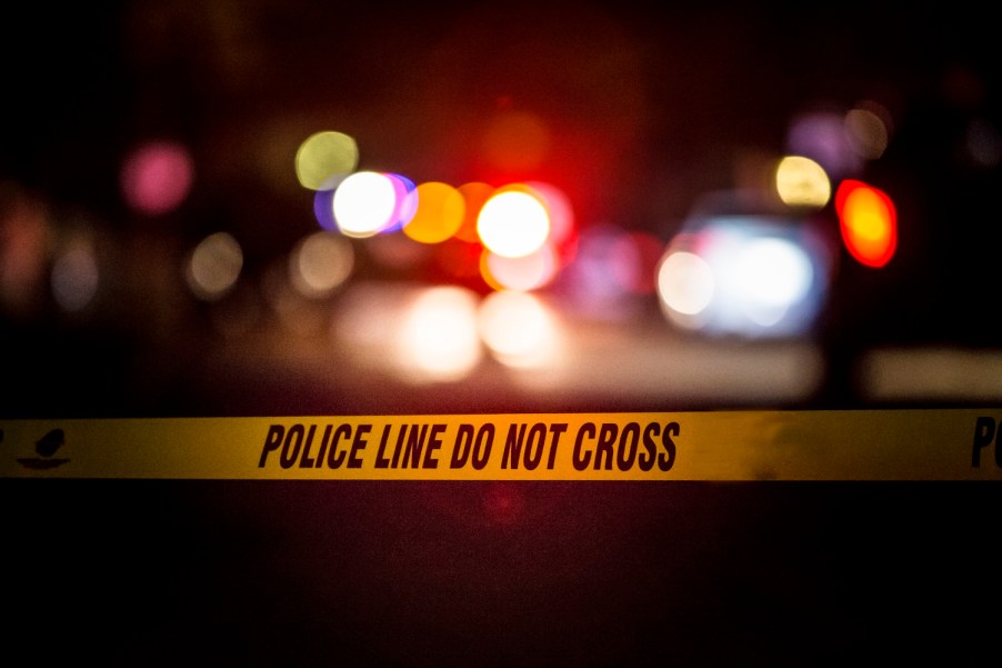 A crime scene with police car lights