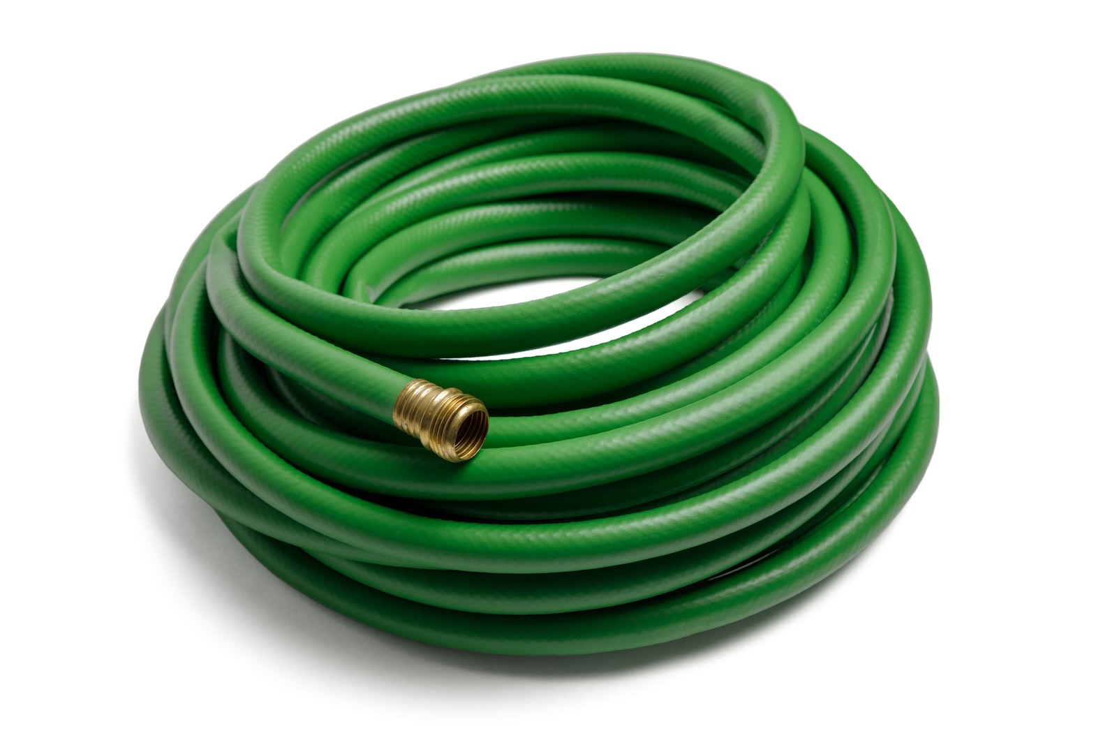 Green garden hose on a white background.