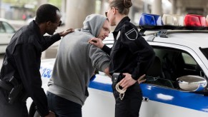 Police officers arresting a man