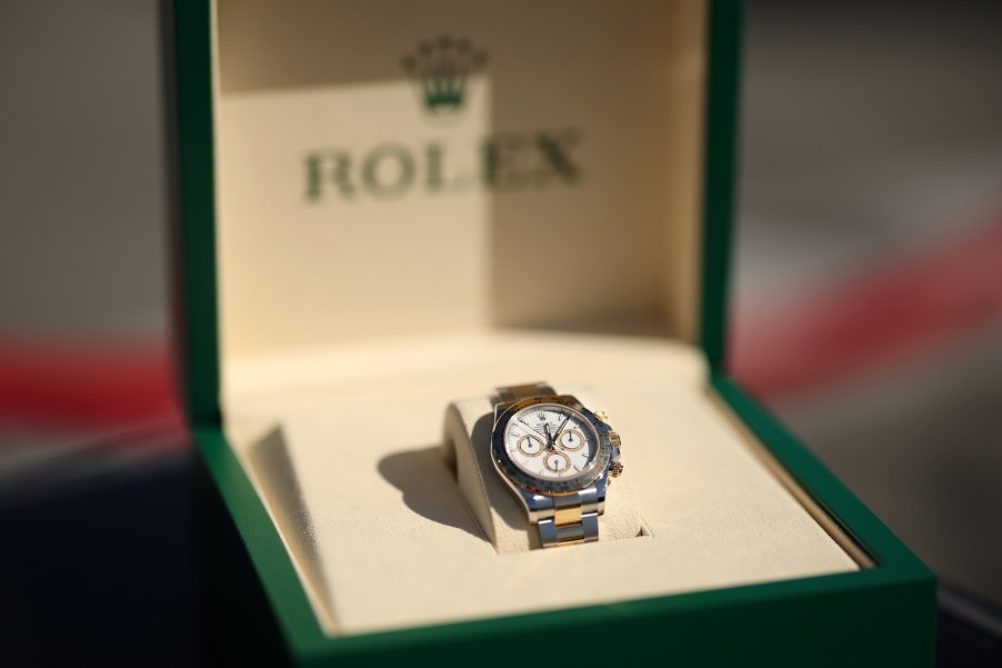 Rolex Daytona watch in green watch box