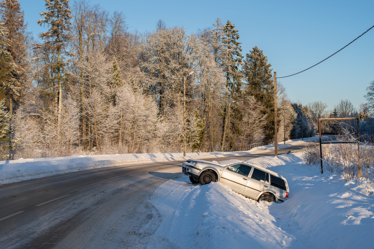 An SUV in a a ditch 