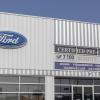 Certified Pre-Owned signage on a Ford dealership exterior