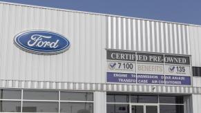 Certified Pre-Owned signage on a Ford dealership exterior