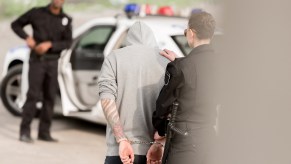 Police officers arresting a man