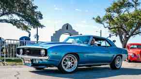 Blue 1969 Chevrolet Camaro at a car show.