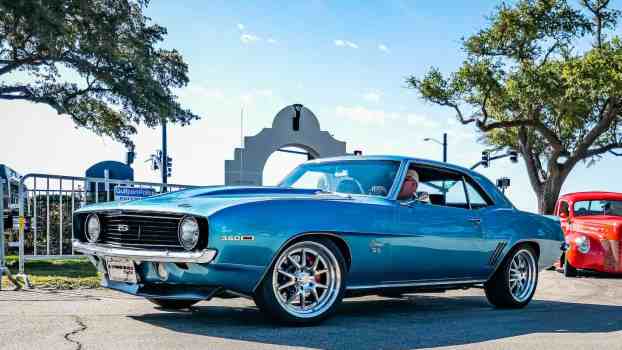 Blue 1969 Chevrolet Camaro at a car show.