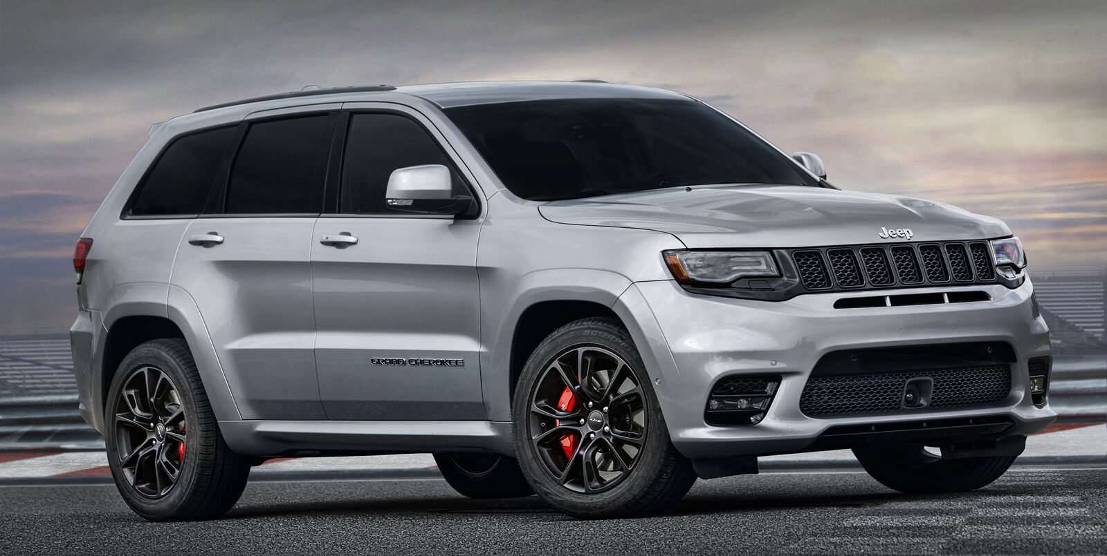 A silver 2017 Jeep Grand Cherokee SRT in right front angle view