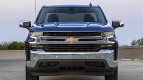 A blue 2019 Chevrolet Silverado parked in direct front view