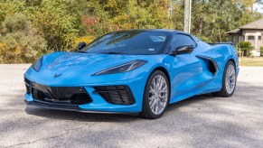 A blue 2023 Chevrolet Corvette Stingray Convertible 2LT Z51 parked in left front angle view