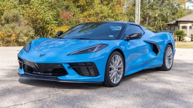 A blue 2023 Chevrolet Corvette Stingray Convertible 2LT Z51 parked in left front angle view