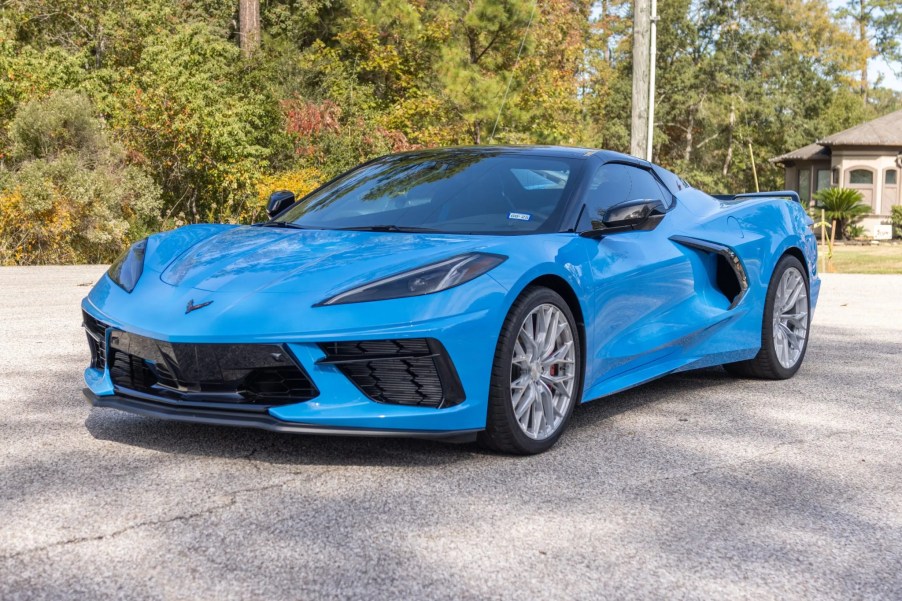 A blue 2023 Chevrolet Corvette Stingray Convertible 2LT Z51 parked in left front angle view