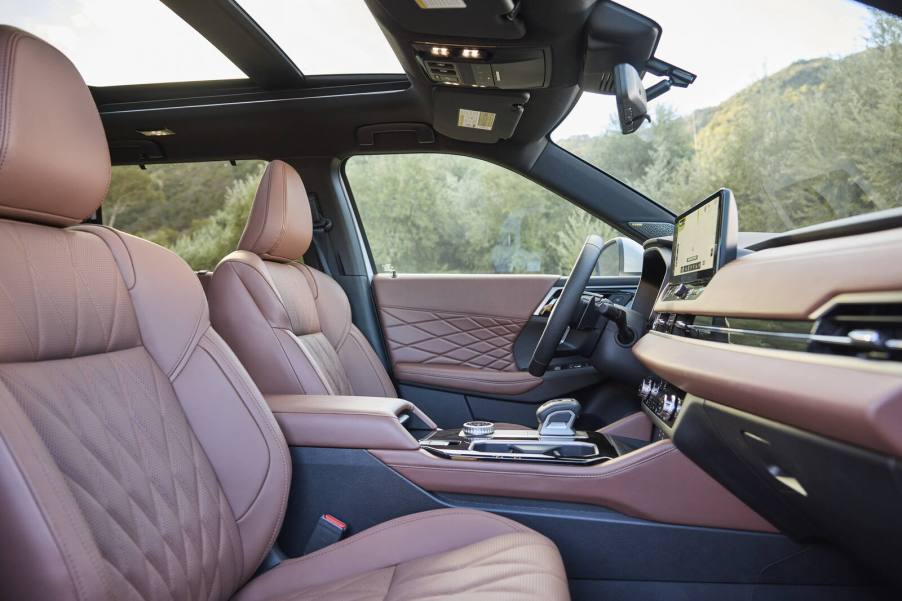 Brown leather interior in a 2025 Mitsubishi Outlander from low right front angle