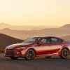 A 2025 Toyota Camry in front of mountains