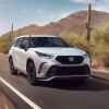 The 2025 Toyota Highlander on the road