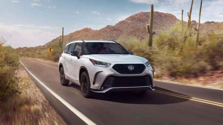The 2025 Toyota Highlander on the road