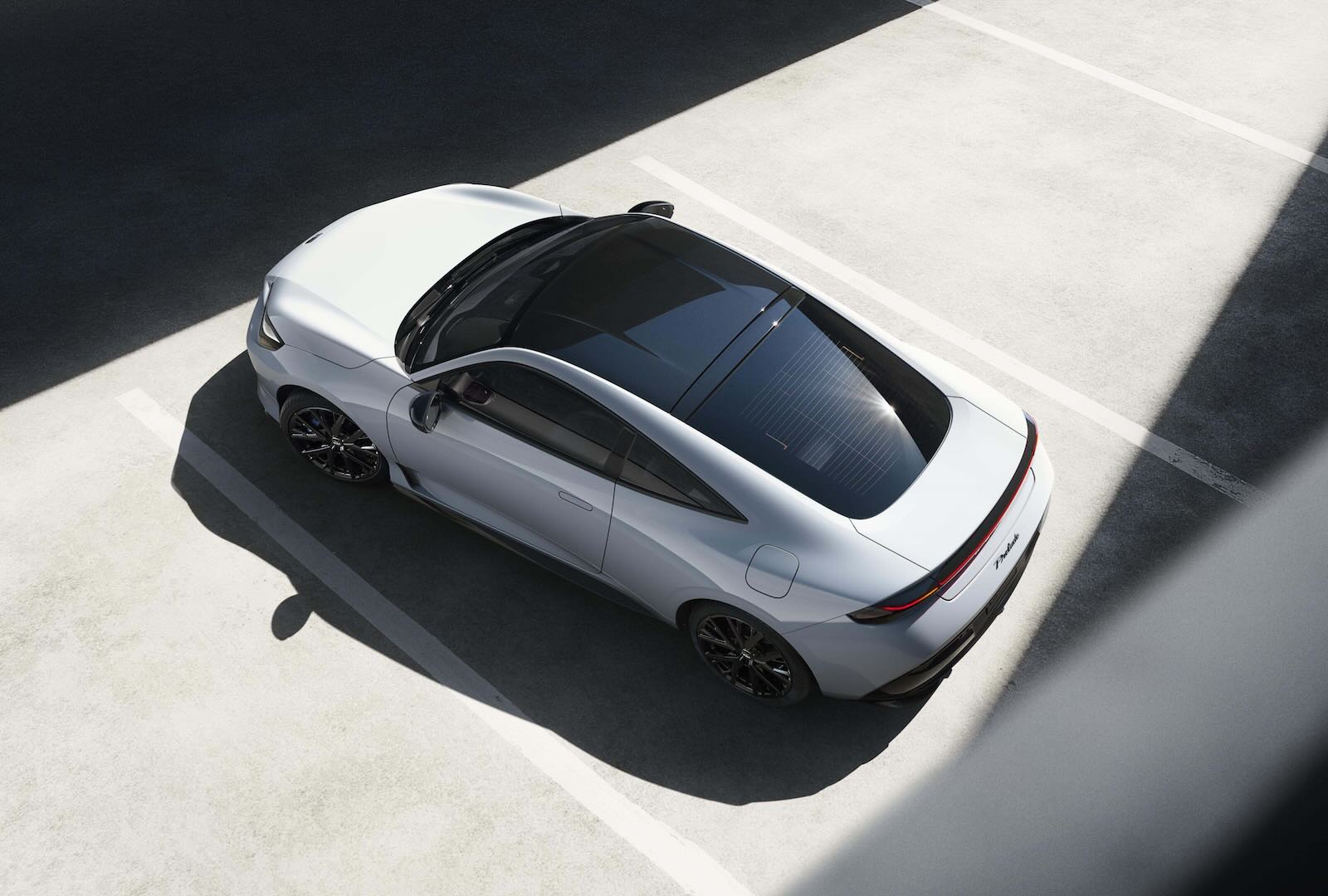 A white 2026 Honda Prelude coupe parked, so you can't rev the engine.