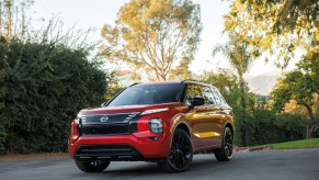 The 2026 Nissan Rogue PHEV on the road