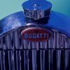 The chrome grille on a vintage Bugatti car at a show.