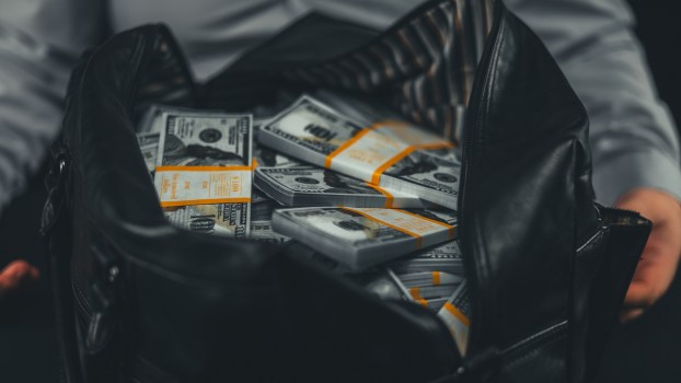 A man with a bag of money