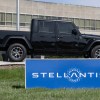 A Jeep Gladiator near a Stellantis sign
