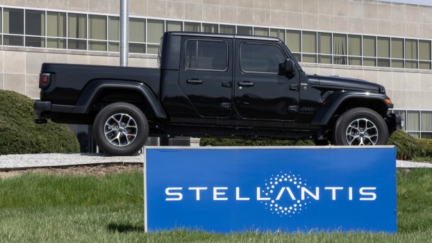 A Jeep Gladiator near a Stellantis sign