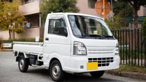 A kei truck parked on the street